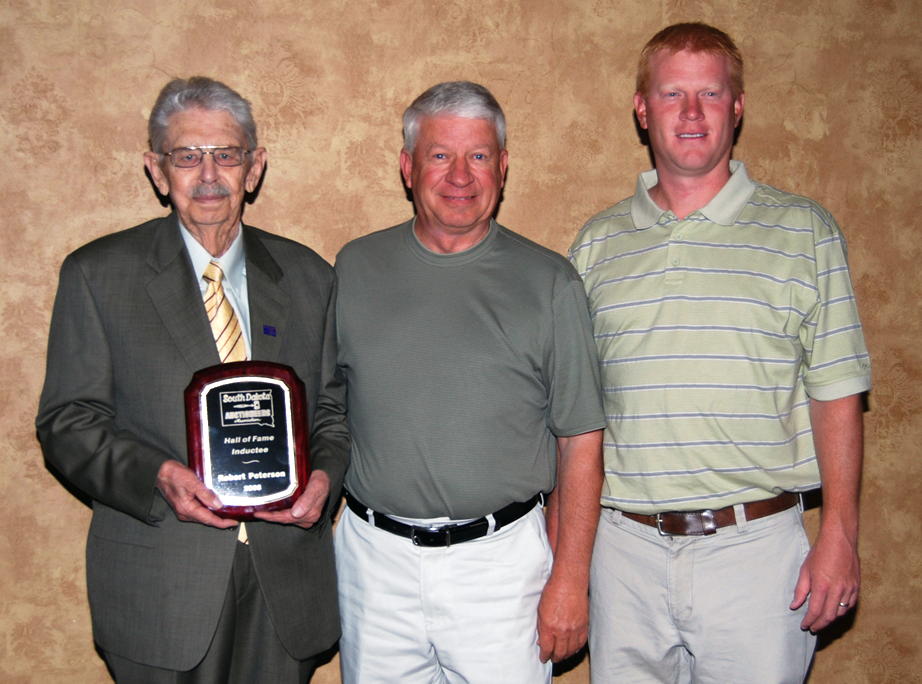 From left to right: Robert Peterson, Brookings, was inducted into the 