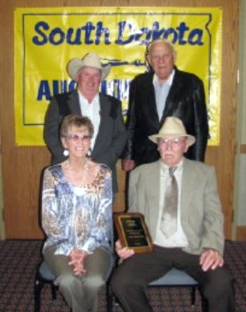 Accepting the Hall of Fame award in Memory of Sam Eslinger is his brother Jack (Sharon) Eslinger New Castle Wy. 